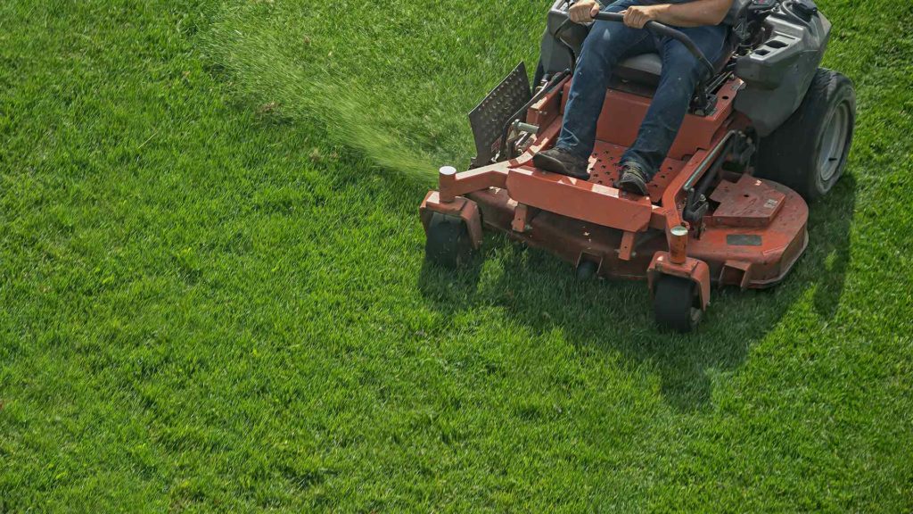 man on sitting lawn mower lubbock tx