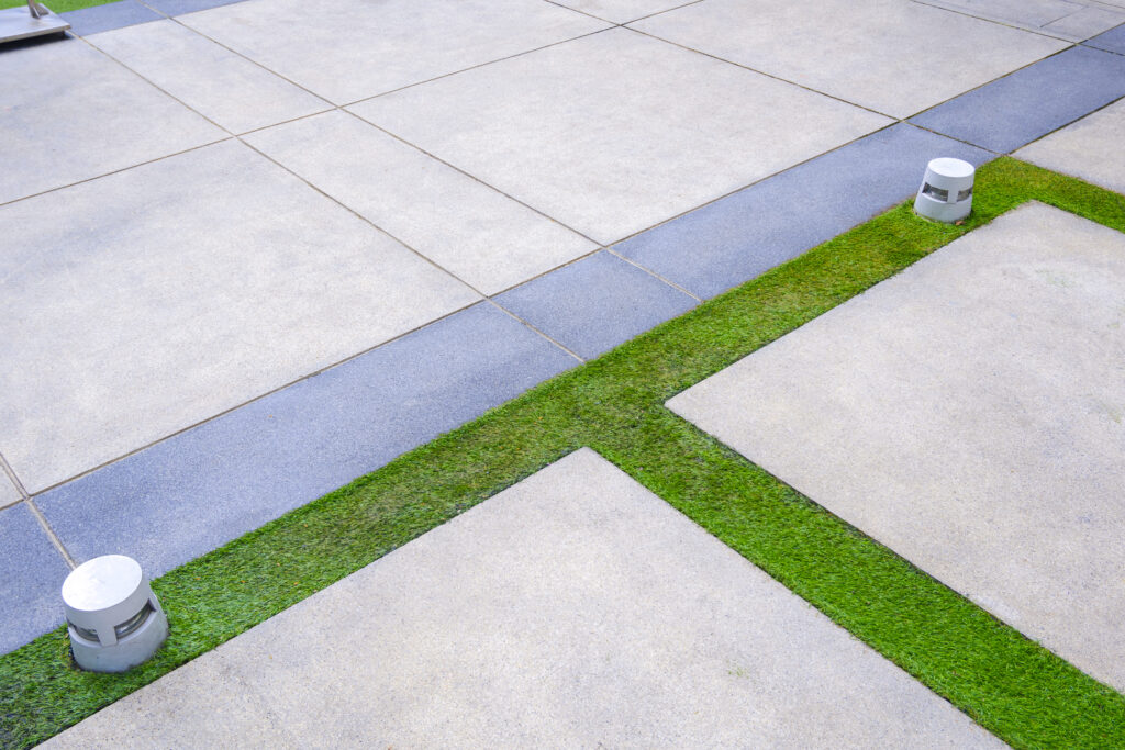 two led ground lanterns on artificial turf and gra 2025 03 10 23 11 59 utc - concrete installation
